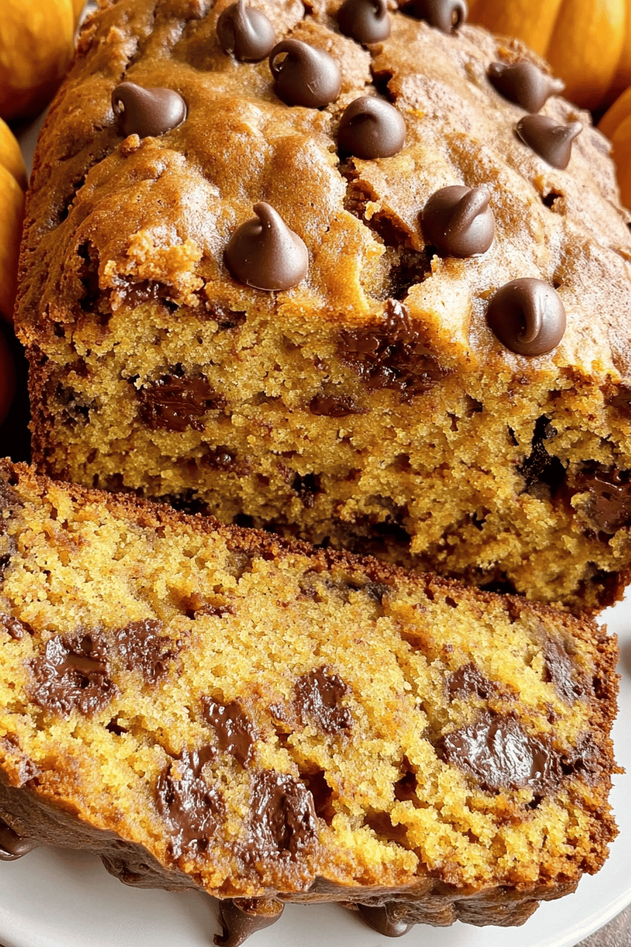 Banana Pumpkin Chocolate Chip Bread slice on plate showing perfect texture and swirl pattern