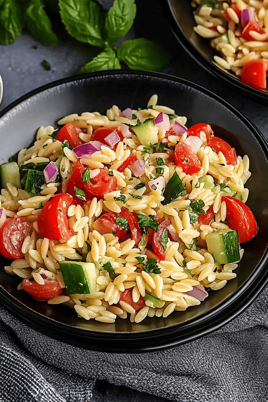 Orzo Pasta Salad Recipe ingredients organized and measured on kitchen counter