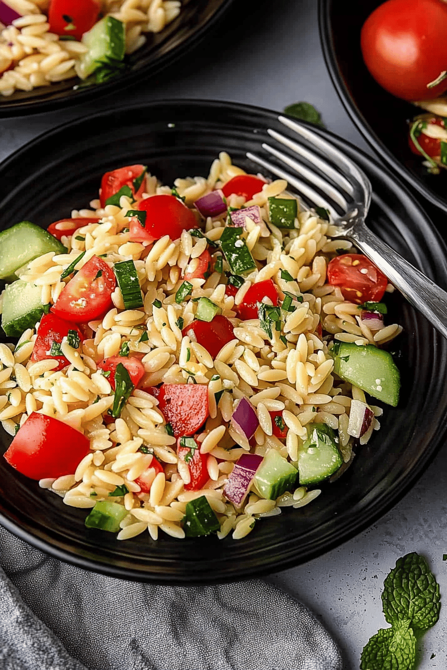 Orzo Pasta Salad Recipe slice on plate showing perfect texture and swirl pattern