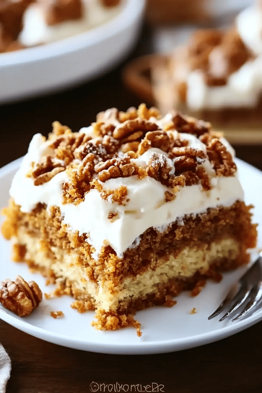 Pumpkin Crunch Cake slice on plate showing perfect texture and swirl pattern