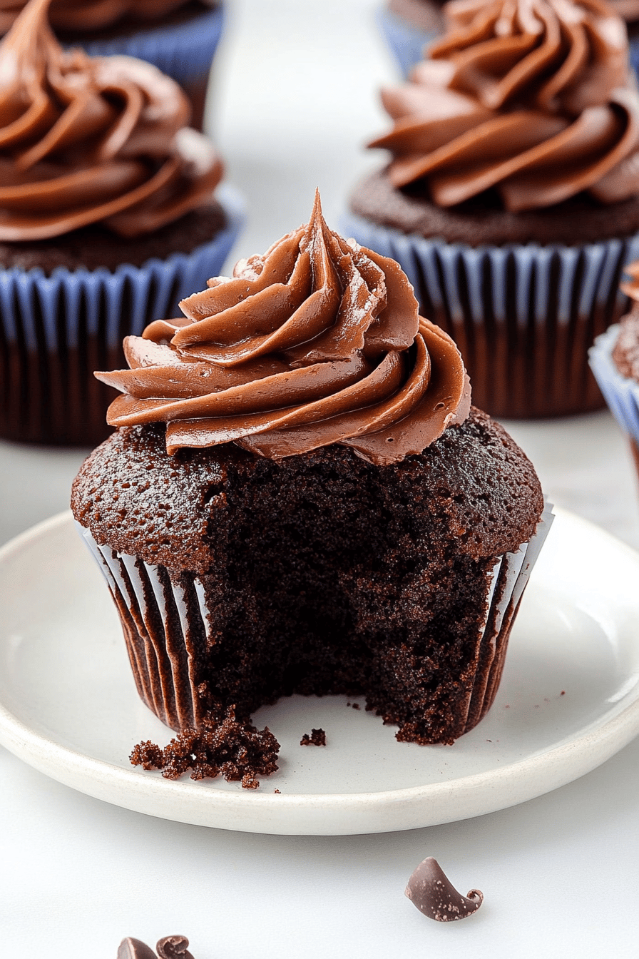 chocolate cupcakes slice on plate showing perfect texture and swirl pattern